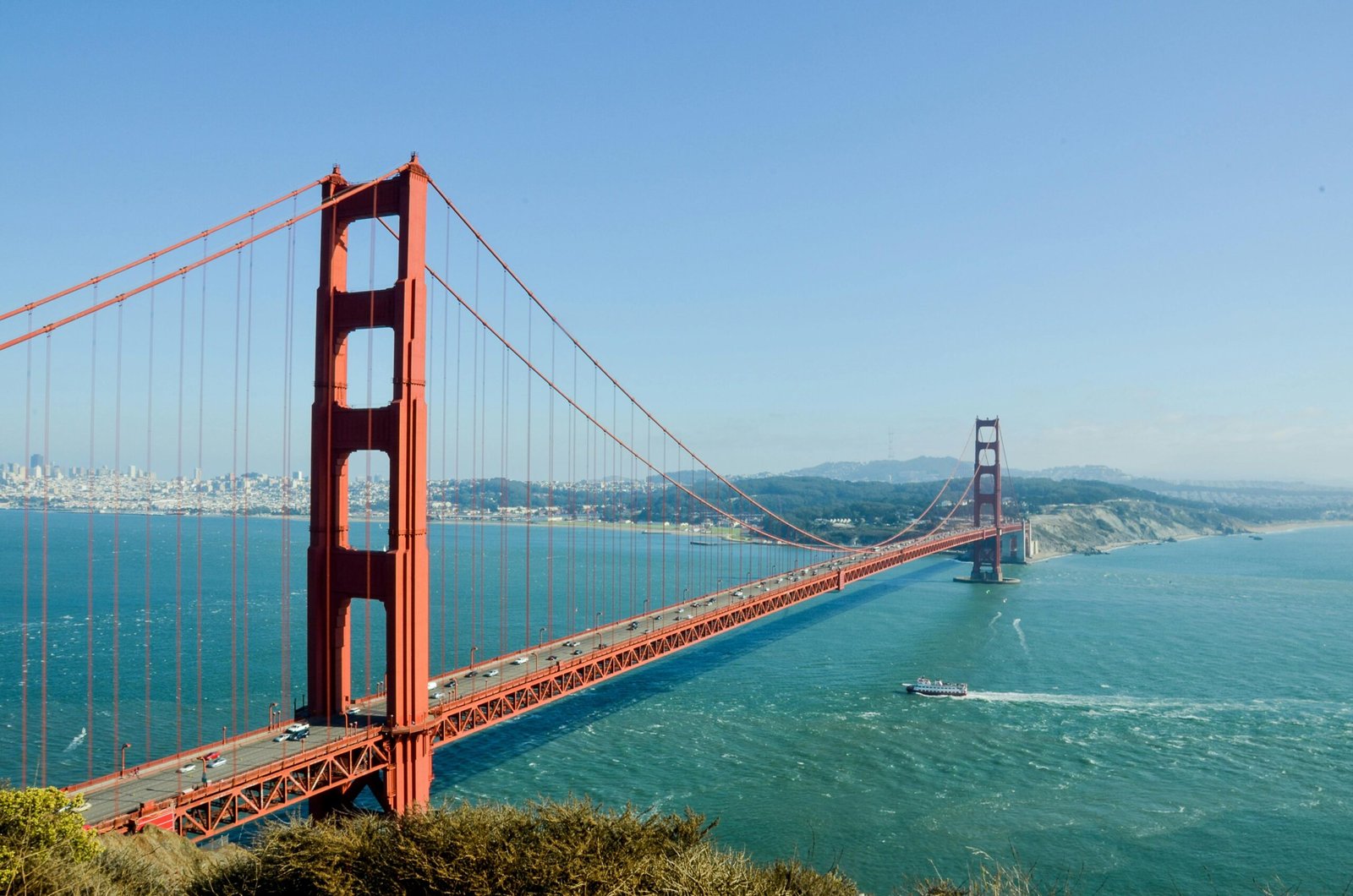 Golden Gate Bridge Vista Point in San Francisco, with a cruise ship sailing towards Vancouver in the distance. [Courtesy Pixabay]